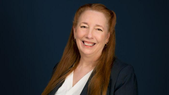 Dr. Nancy Albers smiles in her headshot photo.